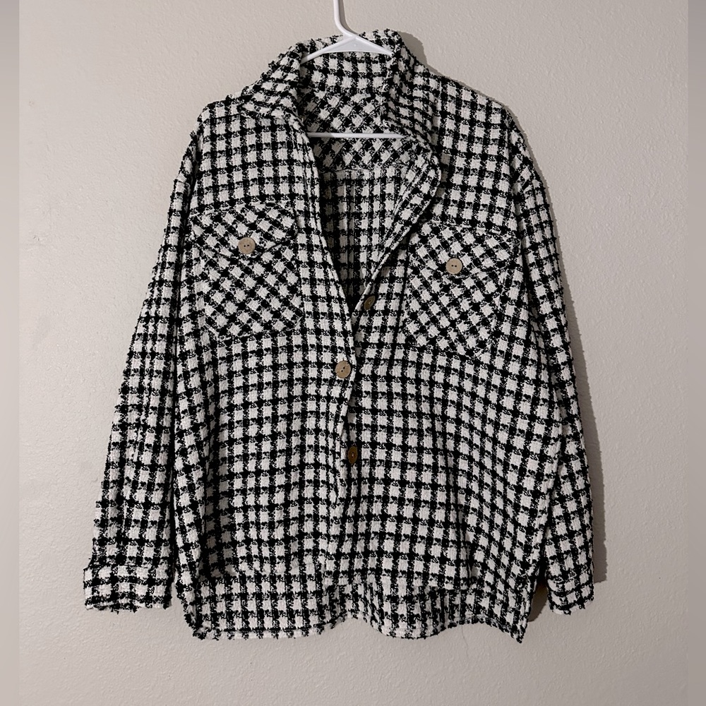 A cute button up, never worn.